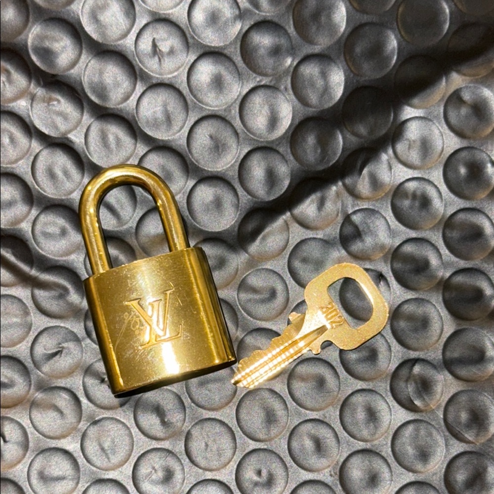 Louis Vuitton Gold Lock and Key